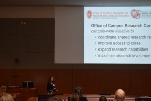 Isabelle Girard, Director of the UW Office of Campus Research Cores, presents the opening remarks.