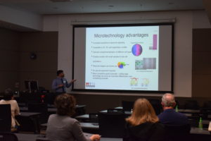 Tony Jimenez-Torres presents "Intro to Micro-Scale Devices for Biomedical Research" at a workshop session.
