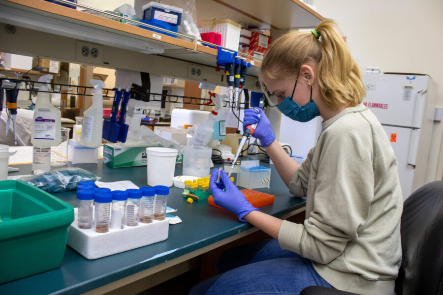 student intern in lab