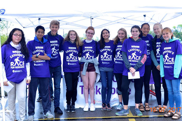 Volunteers at the annual Carbone's Race, a 5K run/walk benefiting cancer research at the UWCCC.