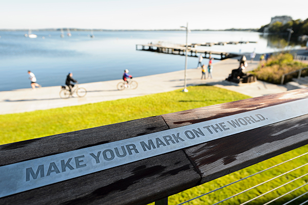 "Make your mark on the world" is one of many inspirational quotes lining the railing of Alumni Park's Progress Point at the University of Wisconsin-Madison